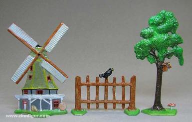 Windmill, tree and fence 