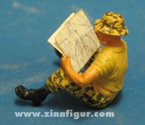 Soldier, sitting, reading 
