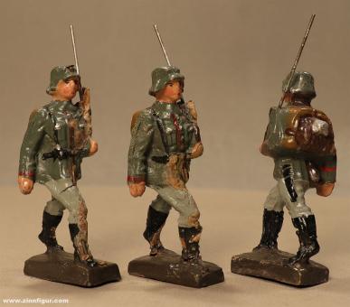 Three reichswehr soldiers marching 