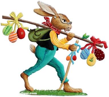 Le lapin de Pâques livre les œufs de Pâques déjà peints 