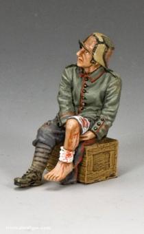 Fritz blessé assis 