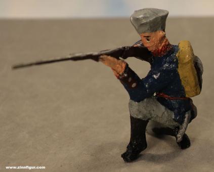 Swedish soldier kneeling firing 